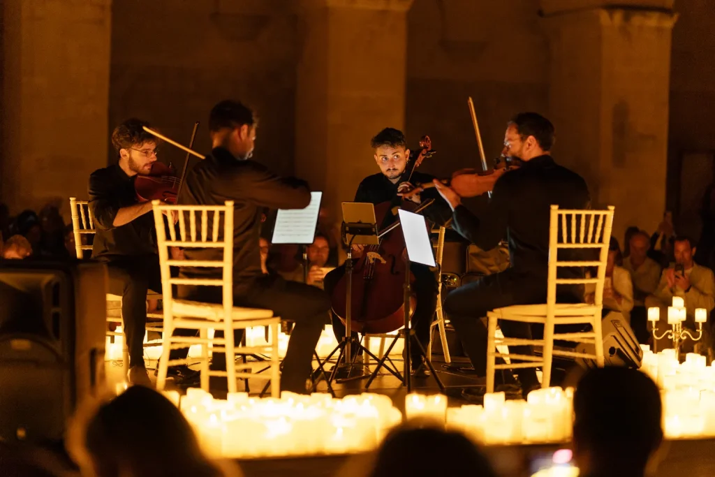 Il quartetto Time2Quartet durante un concerto Candlelight a Lecce